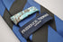 black and dark blue barber striped tie